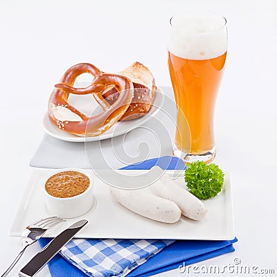 Weisswurst white sausages and sweet mustard with pretzel Stock Photo