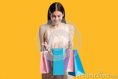 Welcome baby party happy woman looking blue bag Stock Photo