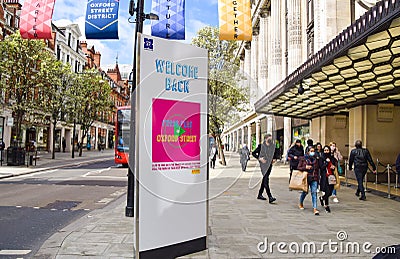 Welcome Back sign outside Selfridges on Oxford Street, London, UK Editorial Stock Photo