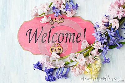 Welcome note and colorful hyacinth flowers Stock Photo