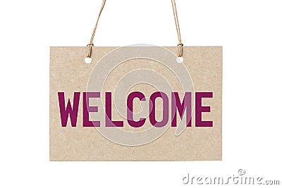 Welcome sign from cardboard paper hanging on rope Stock Photo