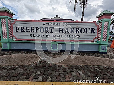 A welcome sign tourists to the Freeport Harbor on Grand Bahama Island Editorial Stock Photo