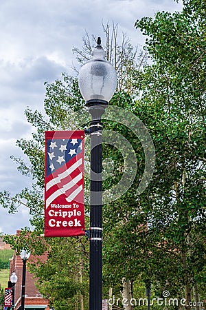 Welcome to Cripple Creek banner on a lamp post Editorial Stock Photo