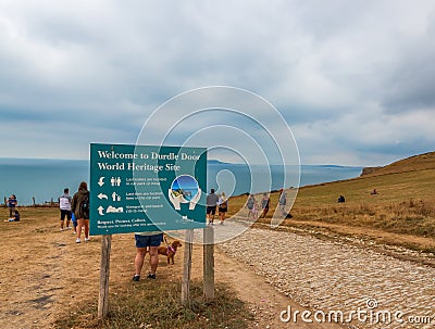 Welcome to Durdle Door World Heritage Site sign at the entry Editorial Stock Photo