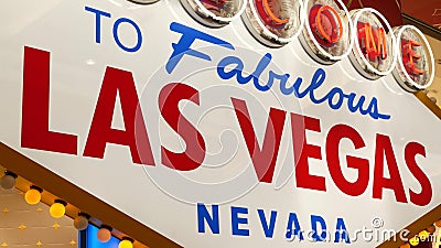 Welcome to fabulous Las Vegas retro neon sign in gambling tourist resort, USA. Iconic vintage glowing banner, symbol of casino, Editorial Stock Photo