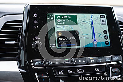 Welcome to Oklahoma text message appear on screen of real-time GPS navigation maps application on display audio Stock Photo