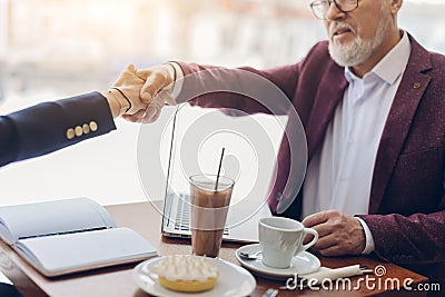 Welcome to our business, company. bearded ,man greeting his client Stock Photo