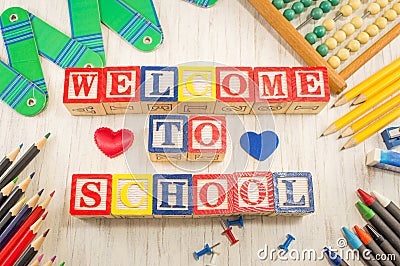 Welcome to school written in wooden cubicle letters Stock Photo