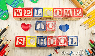 Welcome to school written in wooden cubicle letters Stock Photo