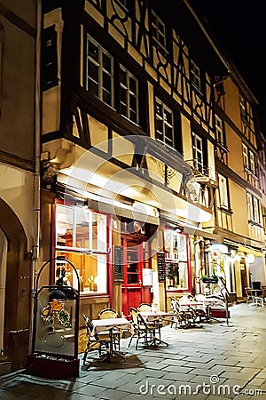 Welcoming French Bistro on a dark winters evening Editorial Stock Photo