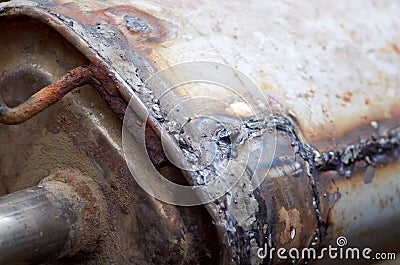 Welding seams on the exhaust system Stock Photo