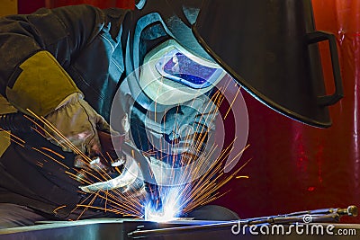 Industrial steel welder in factory Stock Photo