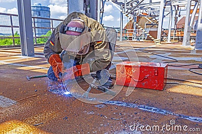 Welder at work at industry site in Neuenkirchen Editorial Stock Photo