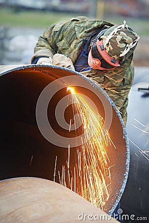 Welder worker with flame torch cutter Stock Photo