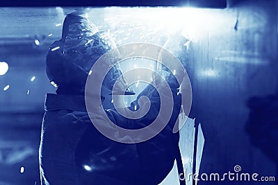 Welder working at factory Stock Photo