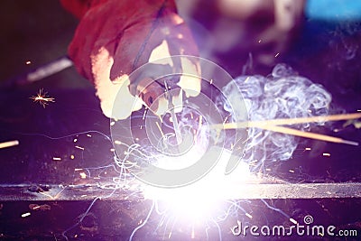 Welder working metal spark Stock Photo