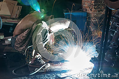 Welders in the use of welding Editorial Stock Photo