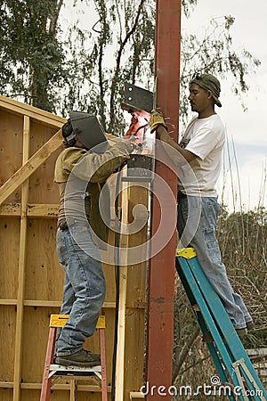 Welders welding steel Editorial Stock Photo