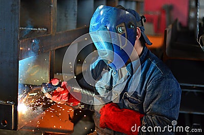 Welders work at the factory Stock Photo