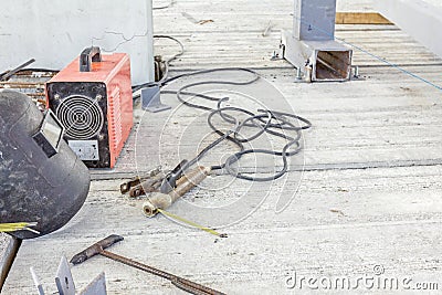 Welding equipment with shield and welder torch, necessary tools Stock Photo