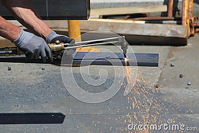 Welding with a oxy acetylene cutting torch Stock Photo