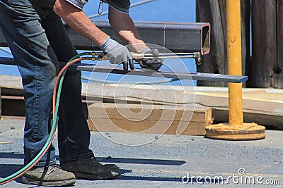 Welding with a oxy acetylene cutting torch Stock Photo