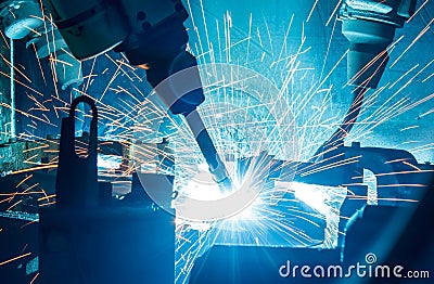 Welding robots movement Stock Photo