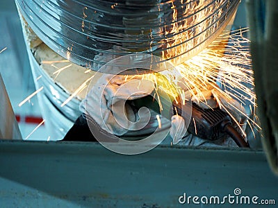 Welding work ,worker with protective welding metal Editorial Stock Photo