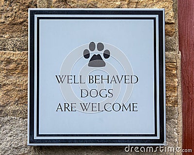 Well Behaved Dogs Are Welcome Editorial Stock Photo