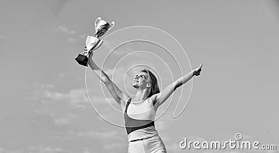 Well deserved reward. Achievement. Successful athlete. Athletic woman leader. Sport motivation. Sport success. Winner Stock Photo