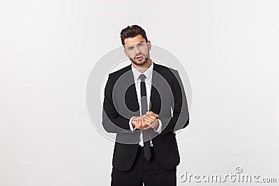 Well dressed man in the studio emphasize thoughtful thinking, think carefully and try to choose to hold hands and stand Stock Photo