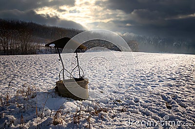 Well in snow land Stock Photo