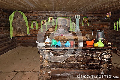 Well, there is a log in a wooden house Stock Photo