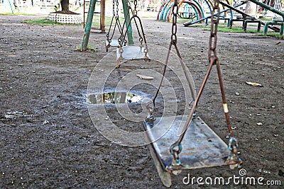 Old style Vintage playground Swings Stock Photo