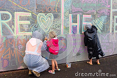 Peaceful Protestors decorate the wall of the Beehive Editorial Stock Photo