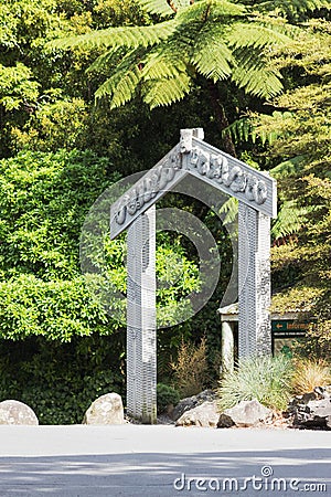 A carved Maori Gateway at the entrance of Otari-Wilton`s Bush Editorial Stock Photo