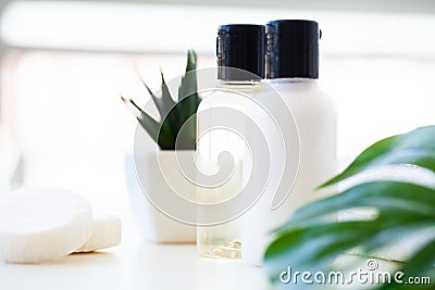 Wellness Products and Cosmetics. Herbal and mineral skincare. Jars of cream, white cosmetic bottles. Without label. Spa Set with Stock Photo