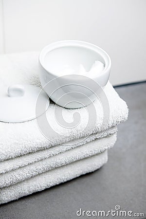 Wellness, white towels and cotton pads Stock Photo