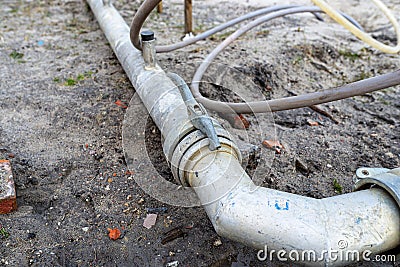 Wellpoint installation to get rid of high groundwater, visible steel tube with a latch. Stock Photo