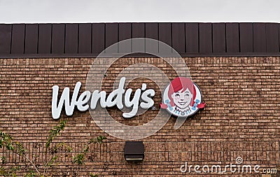 Wendy`s fast food restaurant chain store in Humble, Texas. Editorial Stock Photo