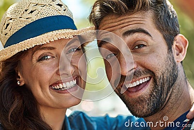 Were ticking another city off our list. Portrait of a happy tourist couple enjoying the sunshine in a foreign city. Stock Photo