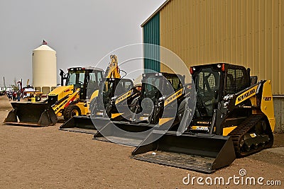 Row of New Holland skid steers Editorial Stock Photo