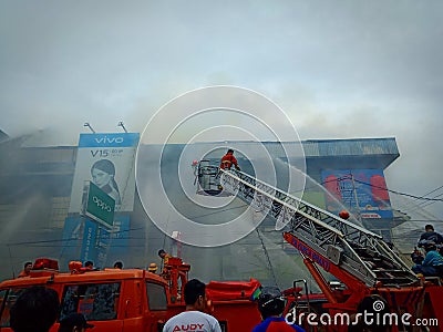 West Kalimantan,Indonesia - 8 Juni 2019,4 houses burned down and the Firefighters extinguish a raging fire in a indonesia house Editorial Stock Photo