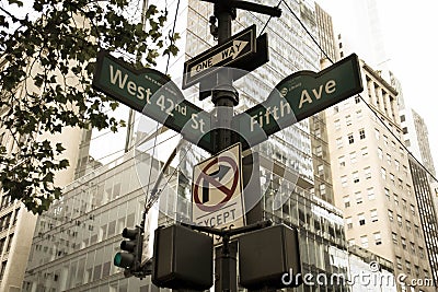 West 42nd Street, Fifth Ave, One way, No turn signs and traffic light on the pole in old vintage style Stock Photo