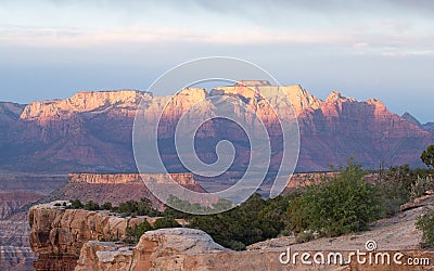 A view of West Temple mountain of Zion National Park seen from Gooseberry Mesa at sunset. Stock Photo