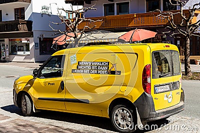 Westendorf, Tirol/Austria: March 29 2019: Small delivery car of the Austrian postal services from the back at an angle Editorial Stock Photo