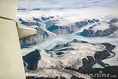 Western coast of Greenland, aerial view of glacier and snow view from plane Stock Photo