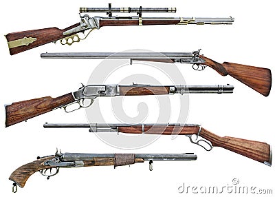 Western cowboy rifle and shotgun booster pack collection of assorted weapons on an isolated white background . Stock Photo