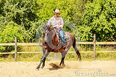 Western cowgirl woman riding horse. Sport activity Stock Photo