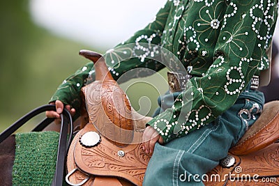Western Rider in Green Sparkles Stock Photo